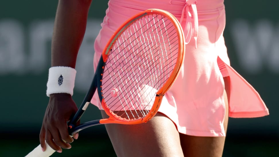 Sloane Stephens of the United States walks to her bench with her smashed racquet after being broken in the second set by Daria Kasatkina of Russia during the BNP Paribas Open at Indian Wells Tennis Garden on March 11, 2024 in Indian Wells, California.