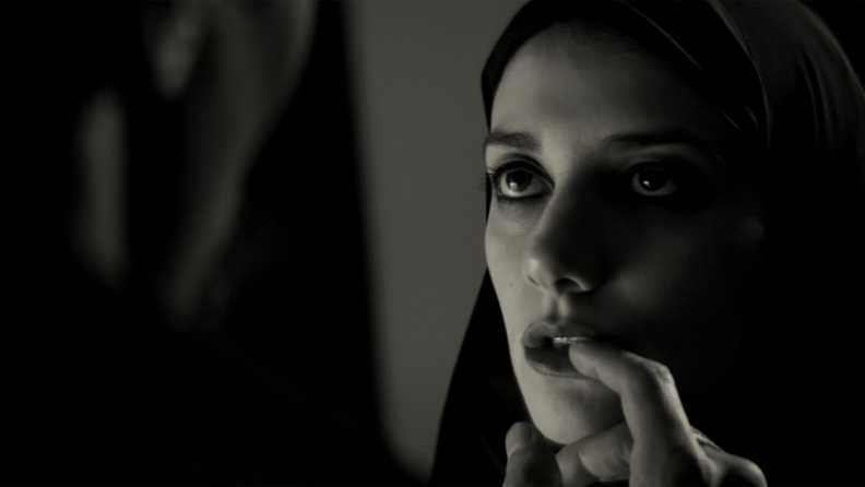 Shot of Sheila Vand as the vampire in A Girl Walks Home Alone at Night.