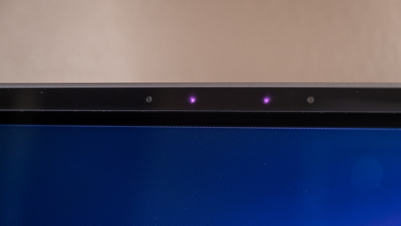 The top of a monitor with two purple lights