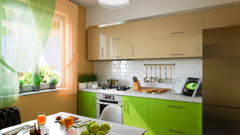 A modern kitchen with green lower cabinets