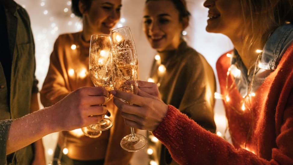 Group of friends toasting with champagne flutes.