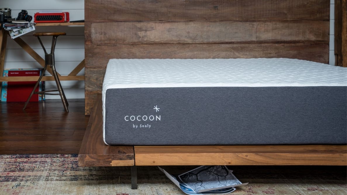 the cocoon chill mattress sits on a wooden bedframe