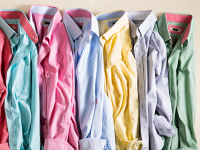 Pile of wrinkled dress shirts in a rainbow of colors