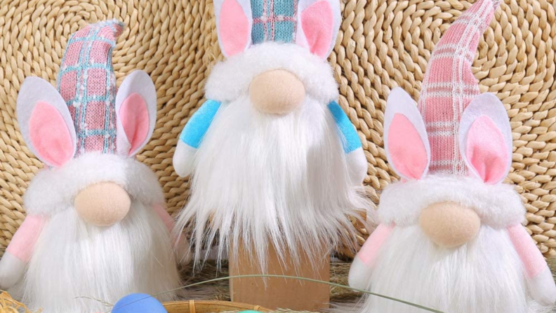 Three gnomes wearing bunny ears