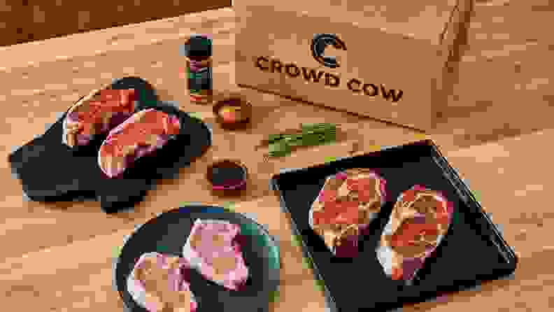 Slabs of beef and a Crowd Cow meal box.