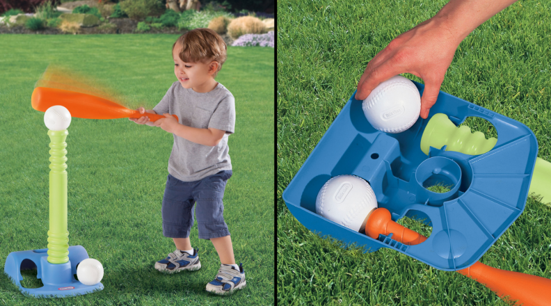 A child takes a swing at a ball on a t-ball set