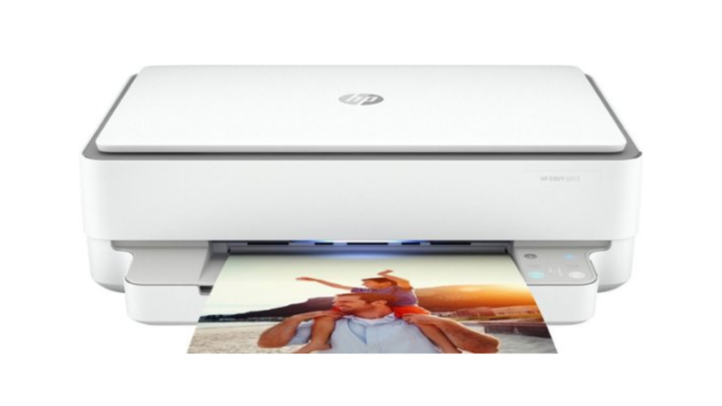 An image of the HP Envy printer in white with a photo emerging onto the tray.