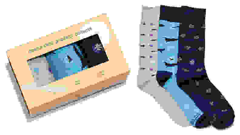 Left: three pairs of socks in a box; right: three pairs of socks
