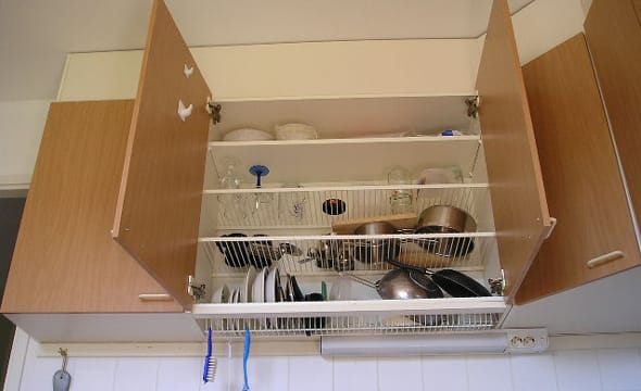 A dish draining closet [Credit: Flickr user
