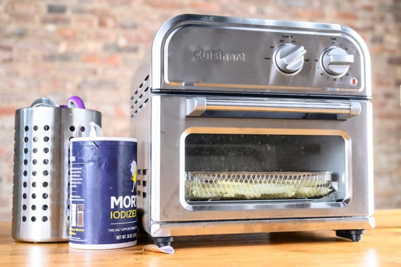 Closeup of an air fryer on a countertop.