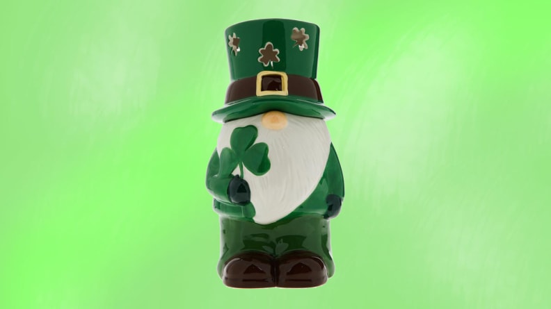 A St. Patrick's Day gnome in front of a green background.