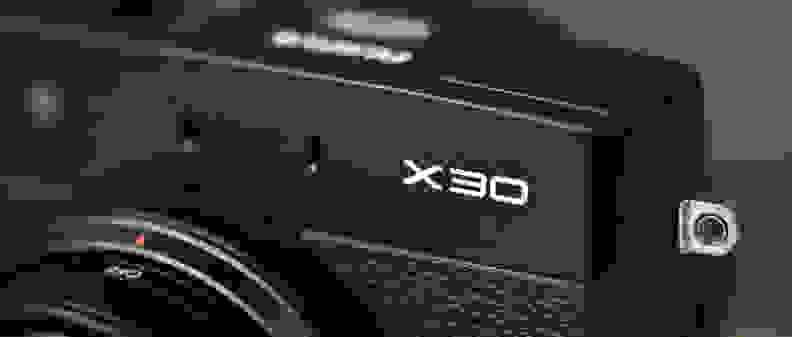 A photo of the Fujifilm X30's logo.