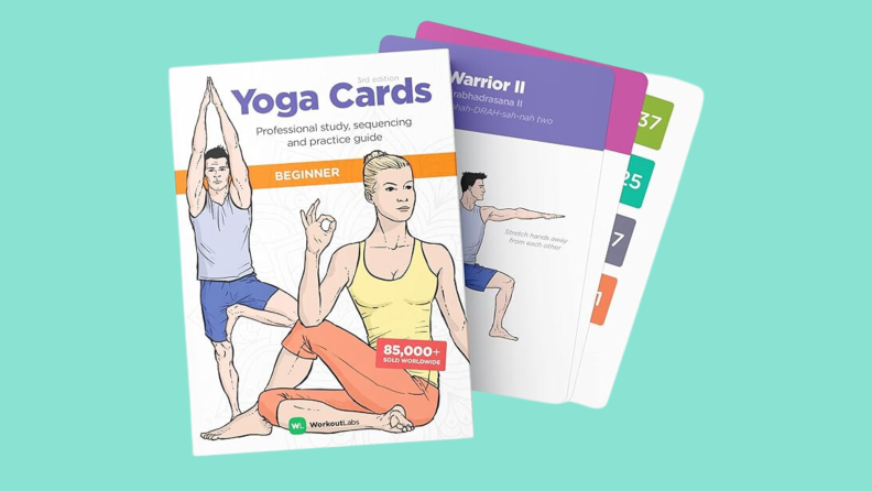 WorkoutLabs Yoga cards on a teal background.