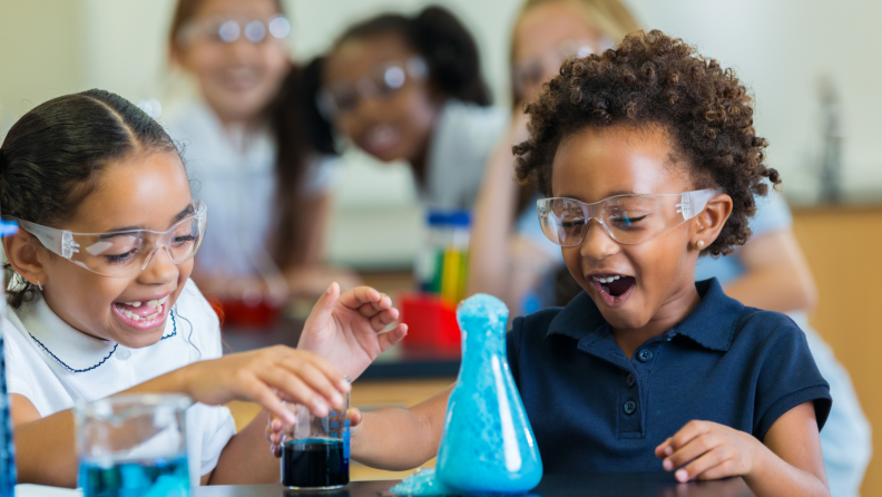 Girls doing science experiments