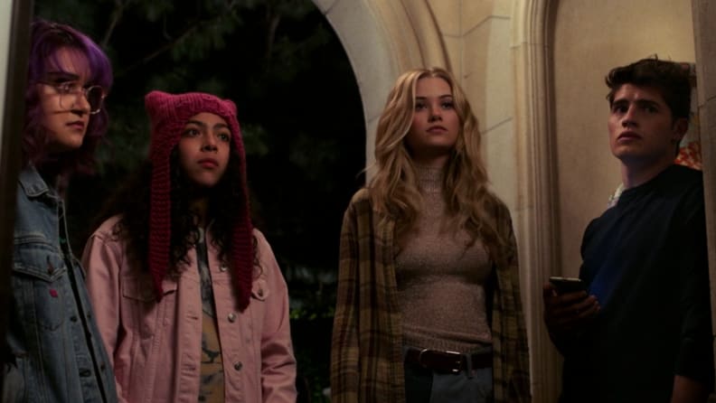 A still from the show Runaways featuring four of the main characters.