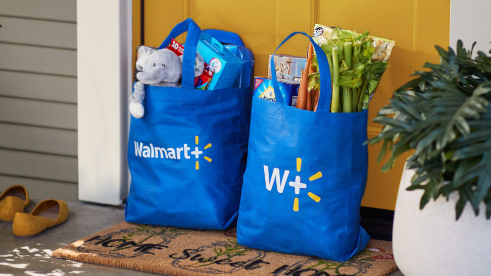 Bags of groceries on a porch.