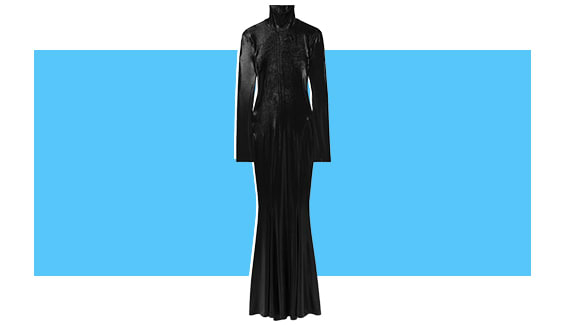 A black velvet maxi dress with long sleeves.