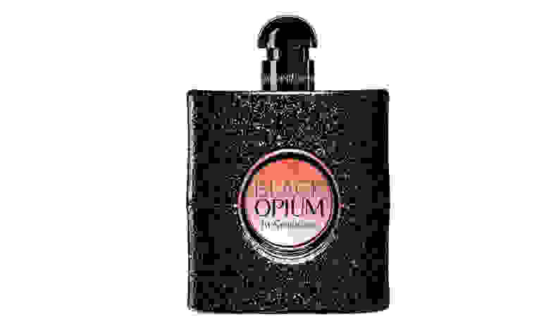 Black/pink perfume bottle on white background