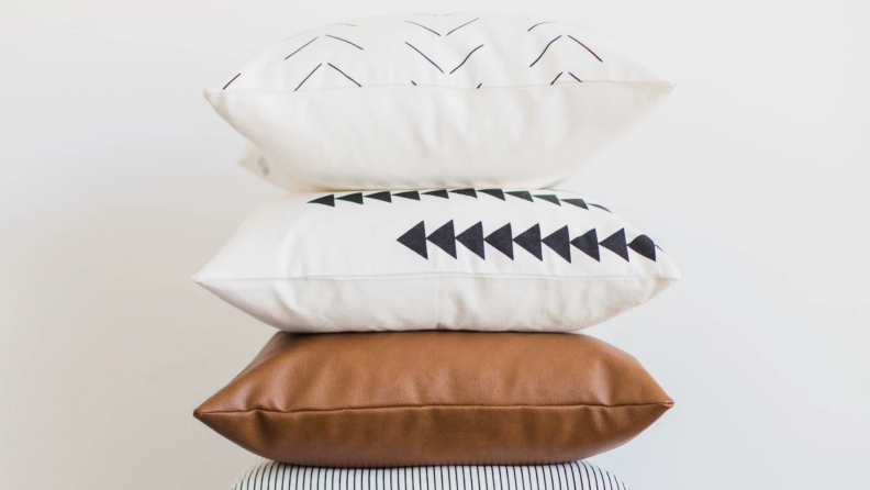 Vertical stack of three Woven Hook Pillow