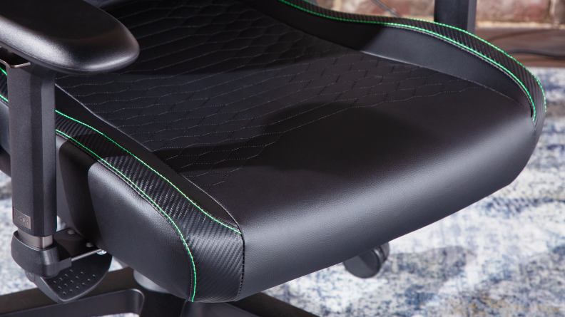Close up of the fabric on the Razer Iskur V2, black fake leather with a wave pattern