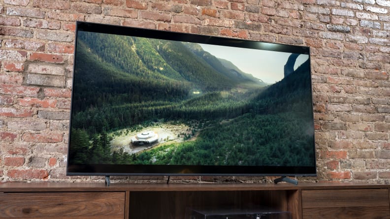 The Samsung Q60A displaying 4K/HDR content in a living room setting
