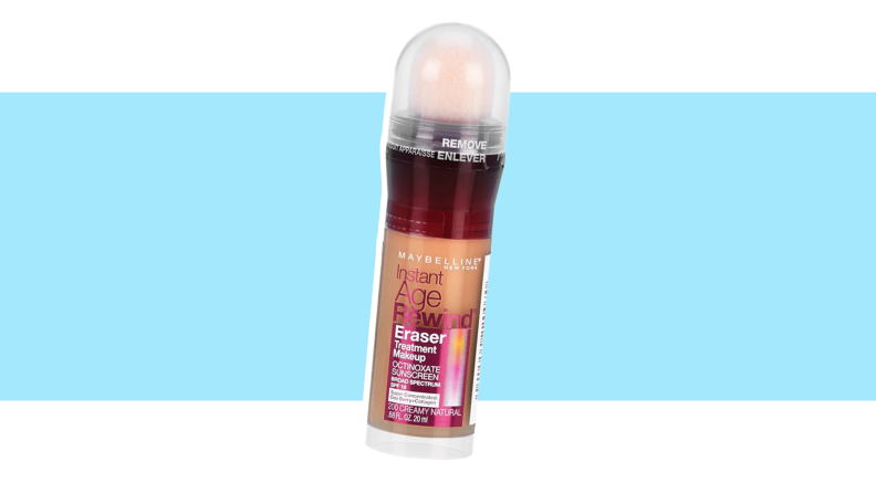A liquid foundation cosmetic tube against a blue background.