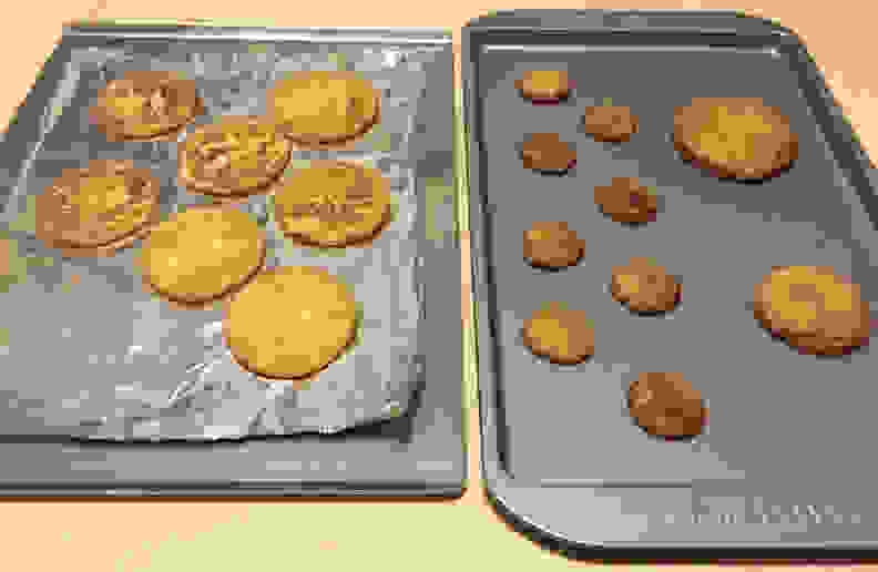 Cookies on aluminum foil and baking sheet
