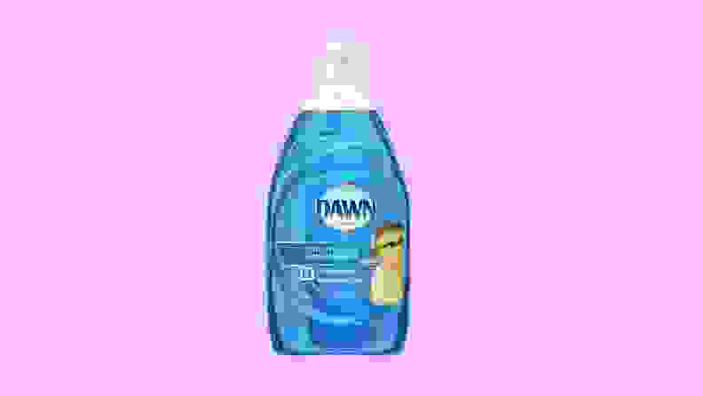 Container of Dawn Ultra dish soap in light blue on a purple background.