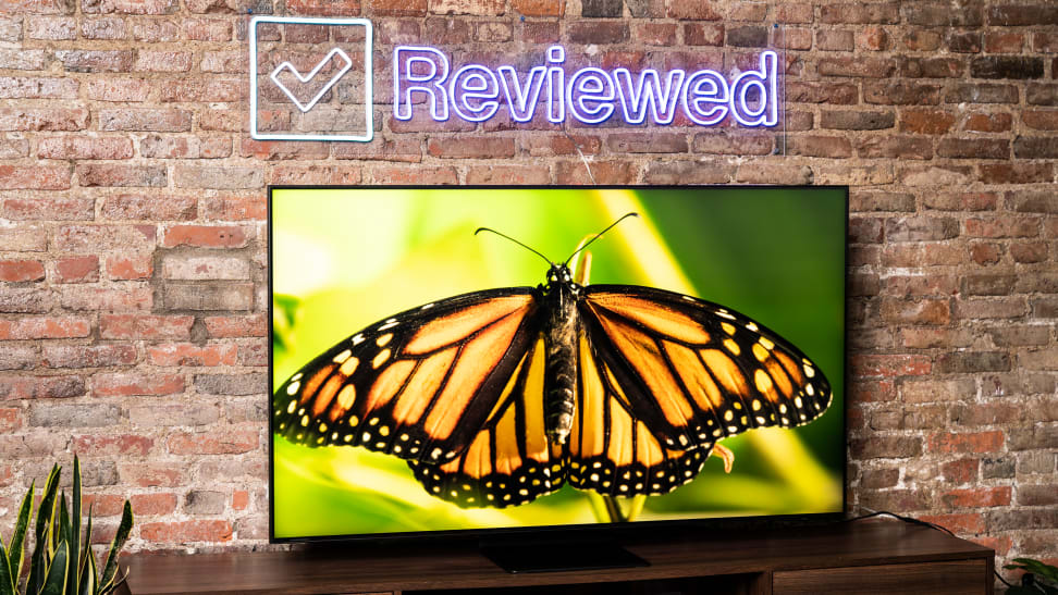 The Samsung QN90B Neo QLED TV displaying 4K/HDR content in a living room setting