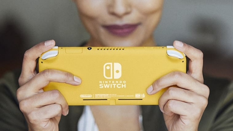 Woman playing yellow switch lite