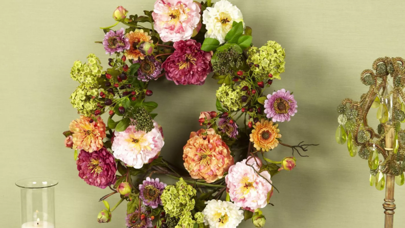 Peony wreath hanging on a wall