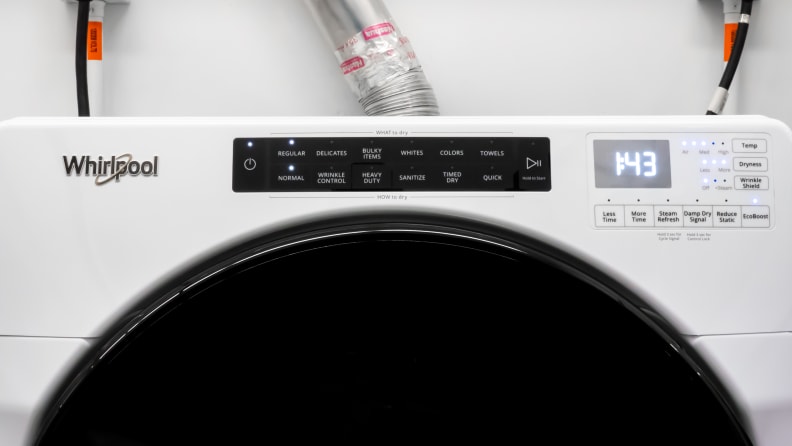 A close-up of the Whirlpool WED6620HW dryer's controls, which contain a central array of What to Dry and How to Dry buttons.  There's an LED readout, along with a few touch buttons for customizing cycle settings.