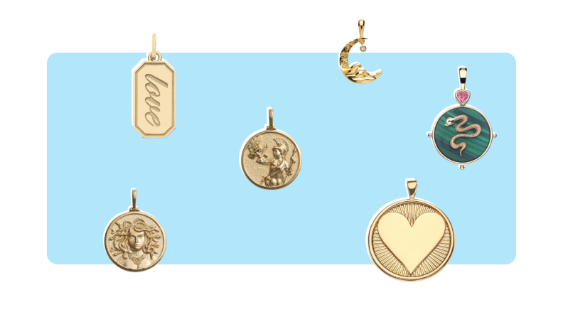 A variety of gold charm pendants.