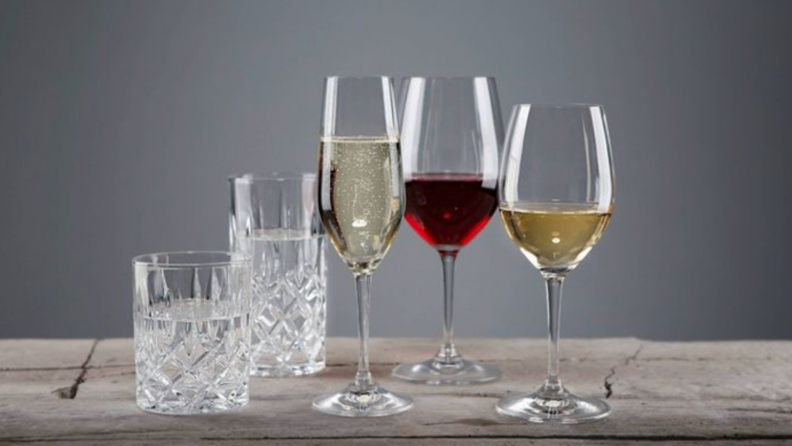 A collection of Reidel glasses that include a champagne flute.