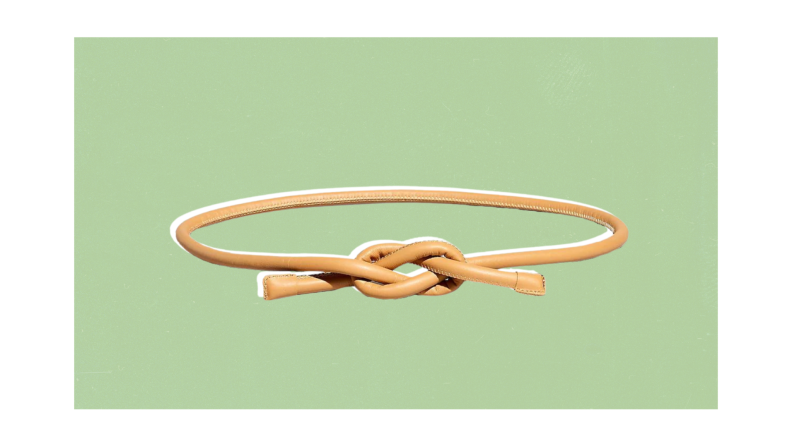 A simple tubular leather belt that ties to close.