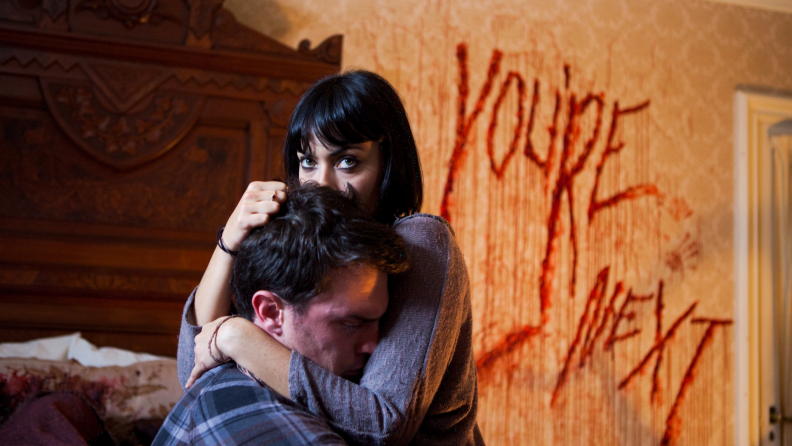 Wendy Glenn and the late Nicholas Tucci play twisted lovers in ‘You’re Next.’