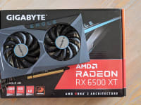 A desktop graphics card sitting on top of its box