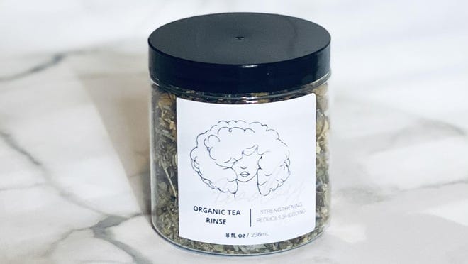 A jar of hair tea rinse.