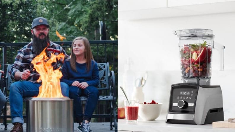 Dad and daughter roasting marshmallows over the Solo Stove / Vitamix blender on a counter filled with fruit and vegetables.