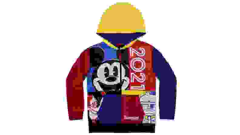 A hooded sweatshirt in primary colors with Mickey Mouse imagery and the numbers 2021