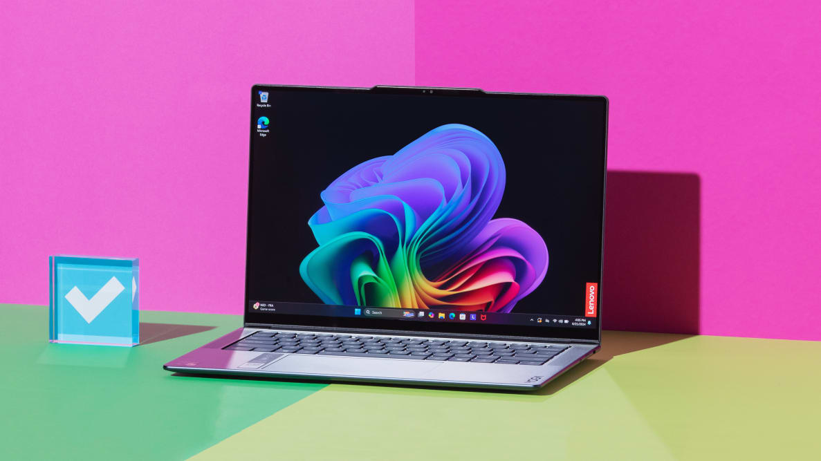 Lenovo Yoga Slim 7x (2024) on a pink background.