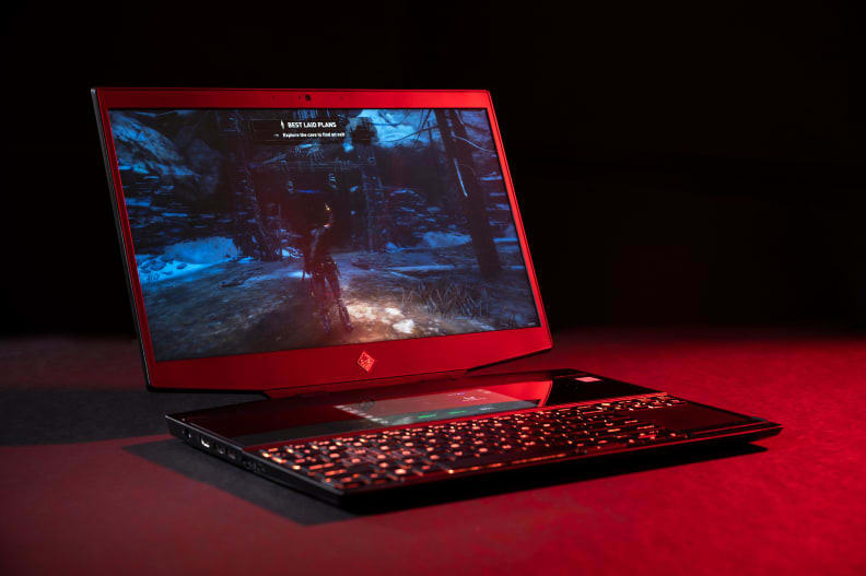 A laptop is in ominous red lighting