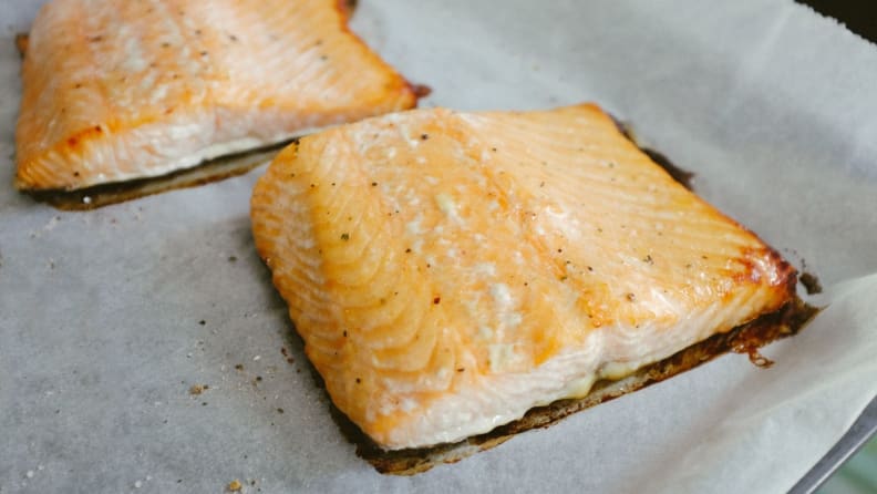 Roasted salmon on a plate.