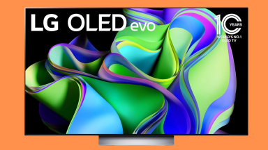 LG C3 TV against an orange background.