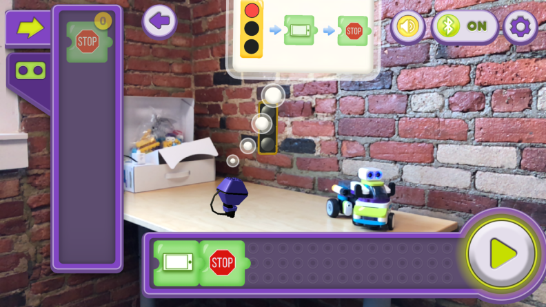 You can solve coding puzzles in augmented reality in the Botzees app.