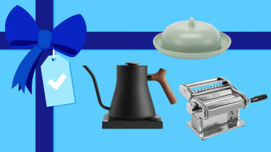 A teapot, butter dish, and pasta maker on a blue gift background