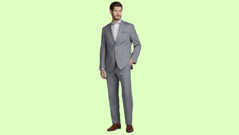 A model wearing a light gray suit.