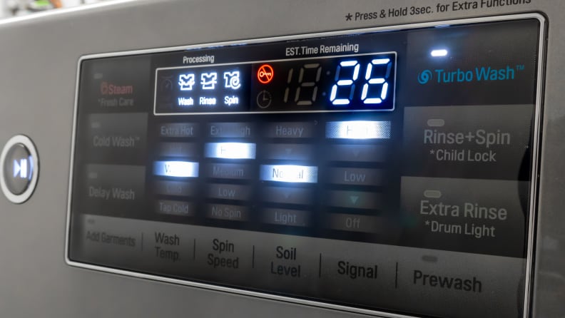 Close-up of the touchpad control panel of the LG WM8100HVA front-load washer.