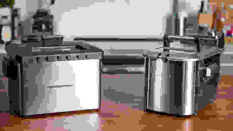 A Hamilton Beach Deep Fryer and Breville the Smart Fryer sit on a kitchen counter.