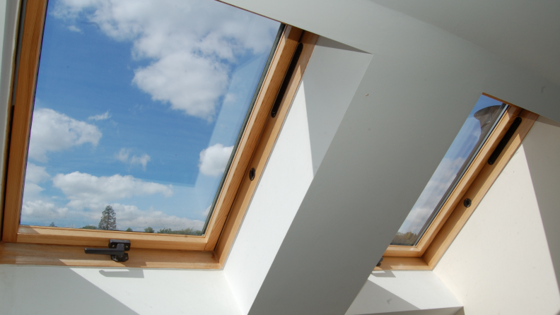 Two skylight windows on ceiling, letting in natural sunlight.